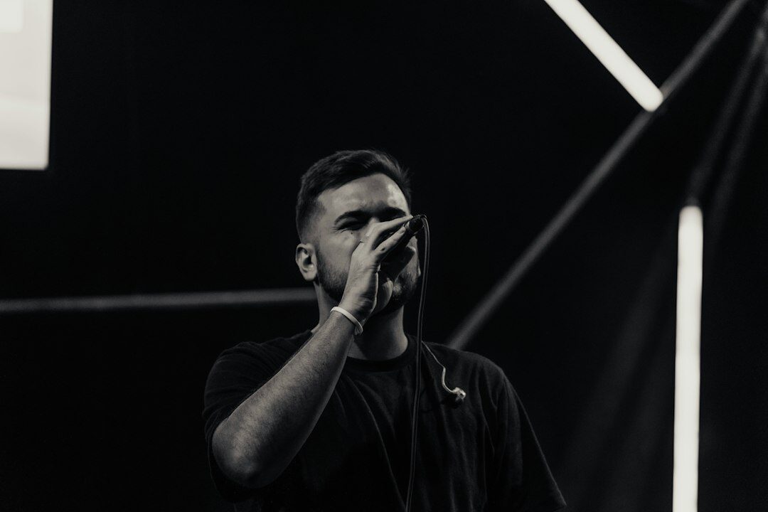 Portrait of a Uruguayan pop singer holding a microphone
